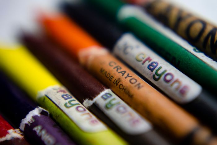 Colourful crayons, representing ink and crayon marks